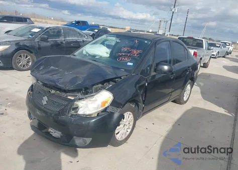 2012 Suzuki Sx4 Le/Le Popular z USA, uszkodzony, nr VIN JS2YC5A32C6304342